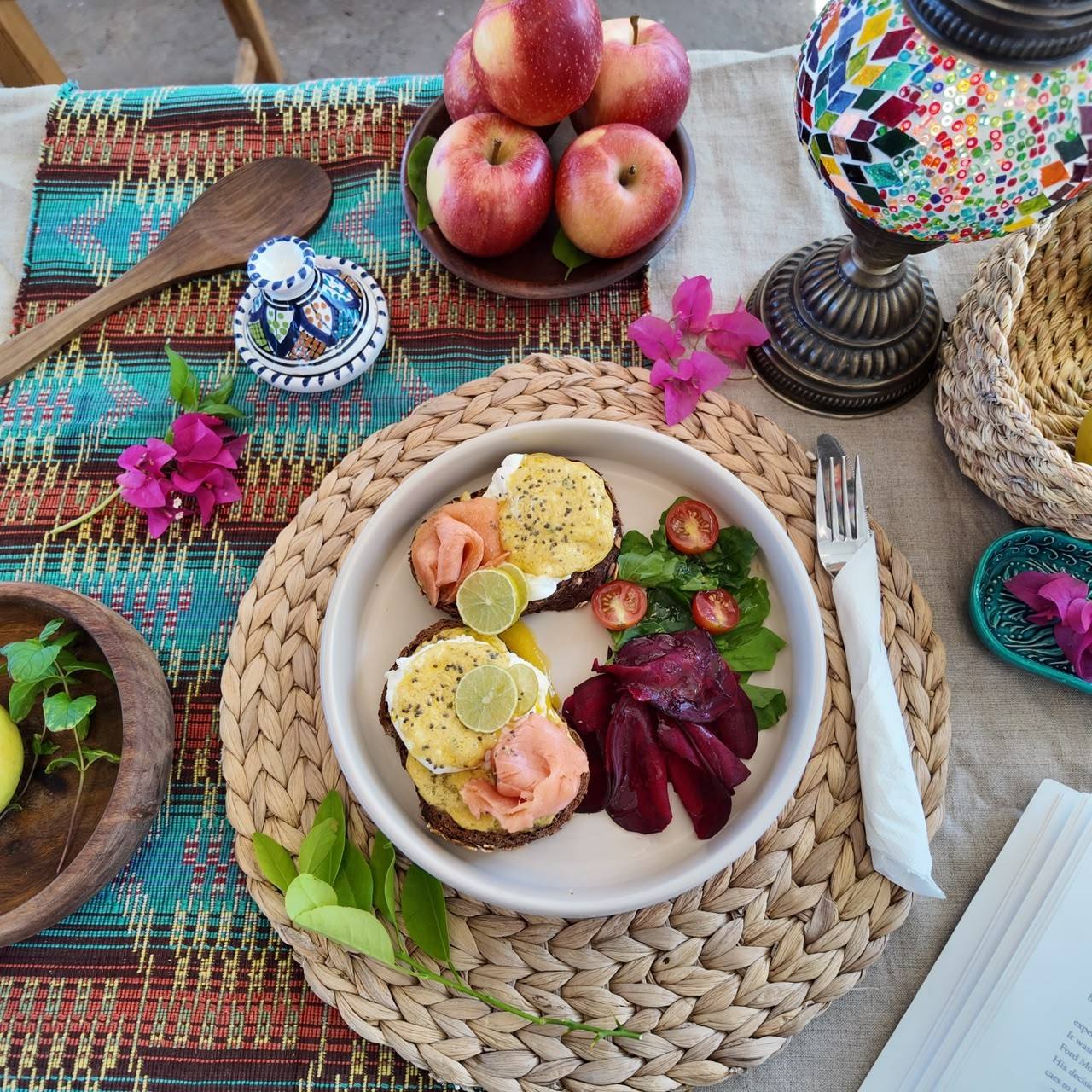 Eggs Benedict with smoked salmon, beetroot and salad